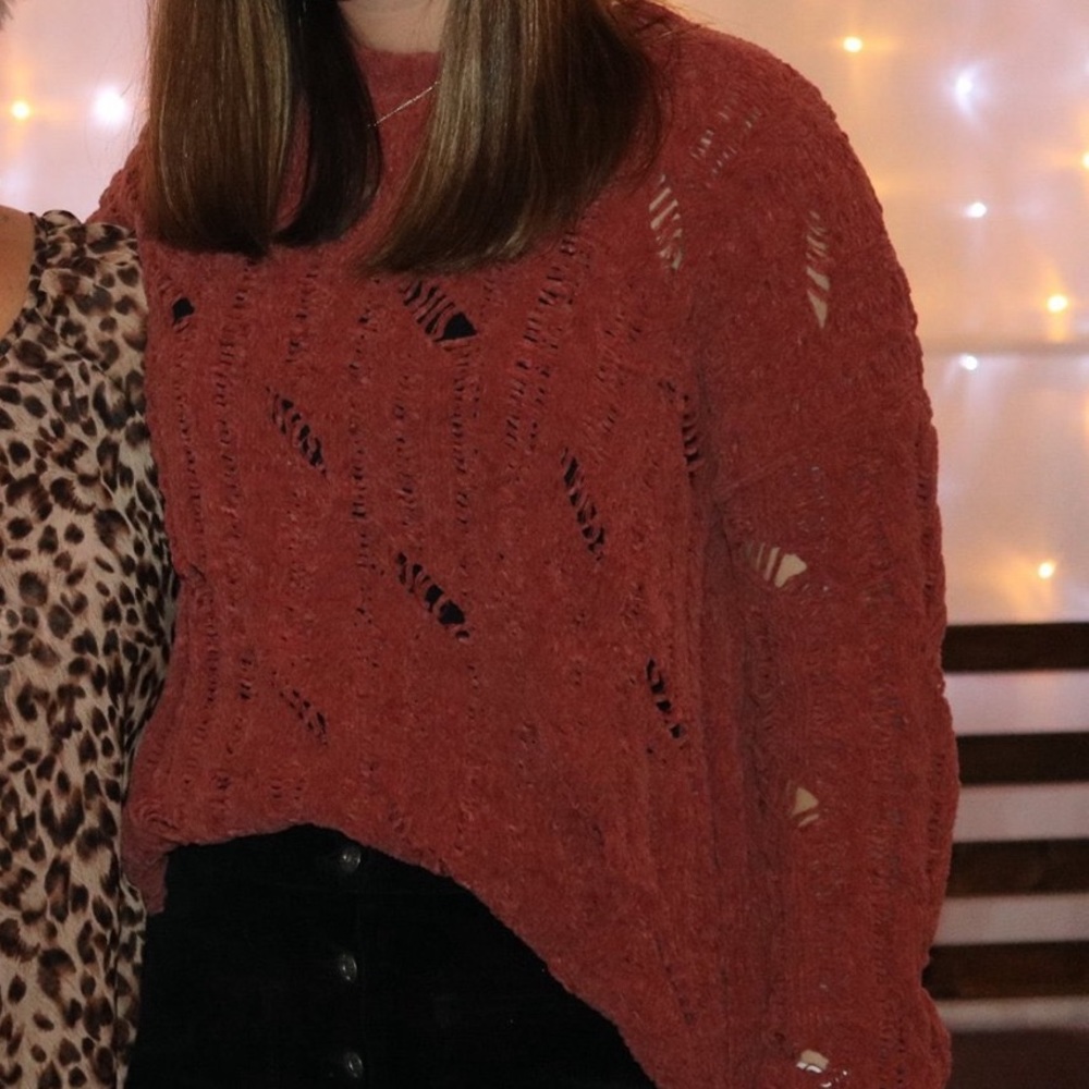 Red/maroon colored knit sweater